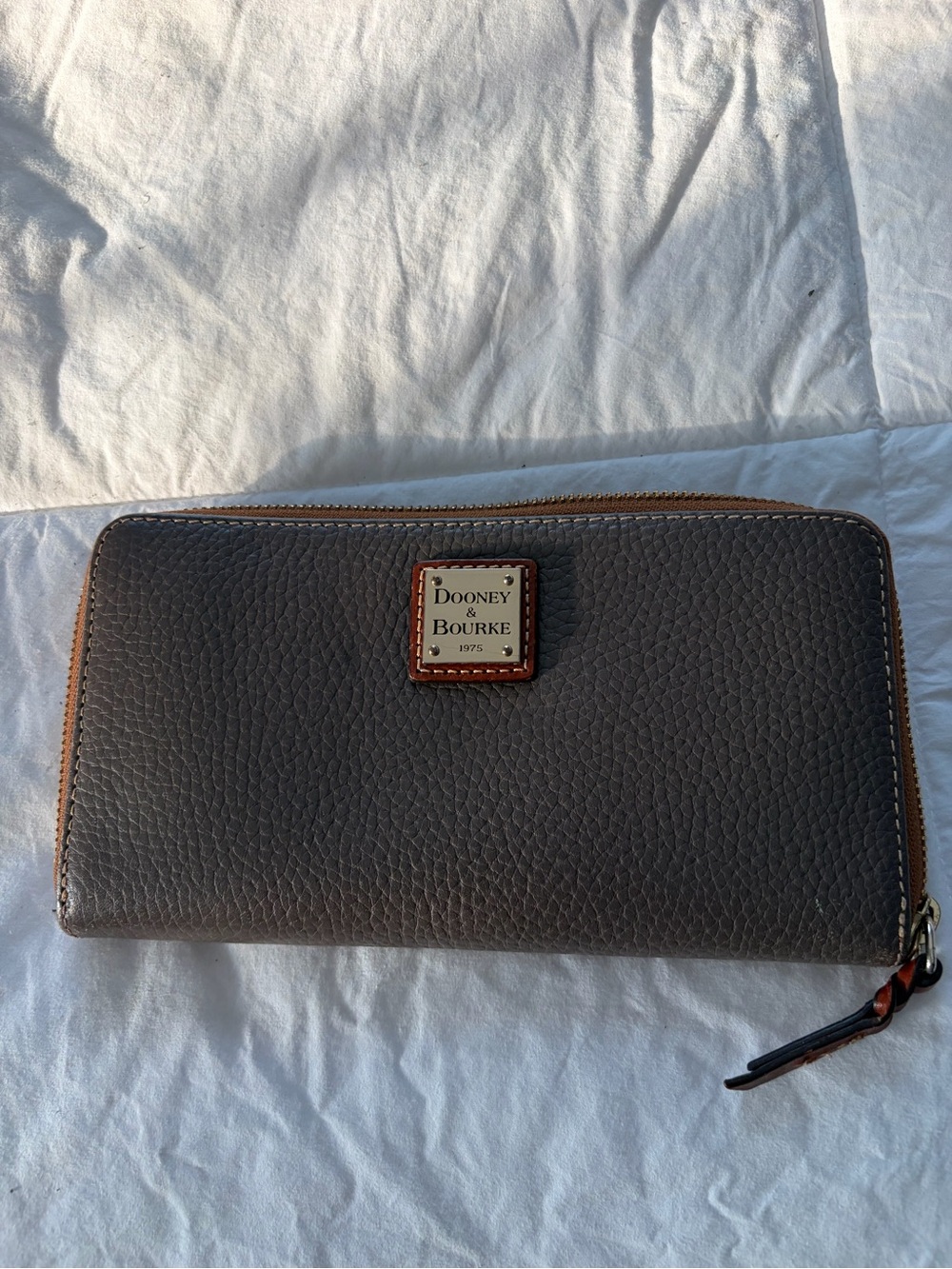Dooney & Bourke Gray Pebbled Leather Zip Around Wallet with Brown Trim